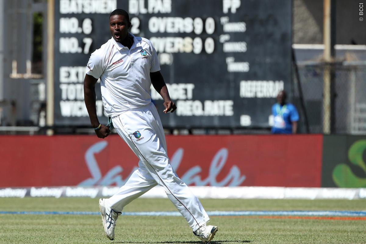 Oops Jason Holder forgets the no-handshake custom