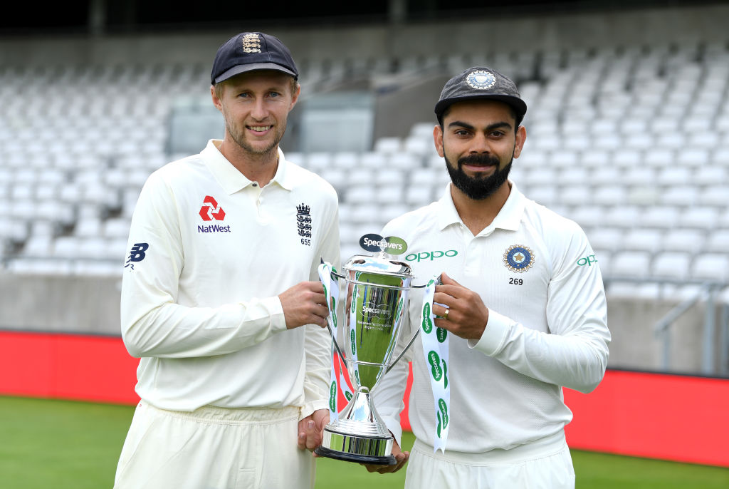Joe Root and Virat Kohli pose with the Trophy