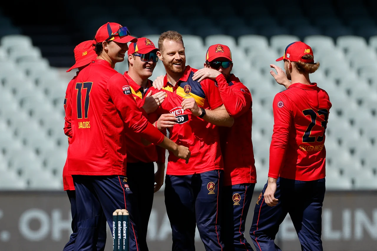 Nathan McAndrew celebrates wicket with his South Australian teammates during the game against Victoria 