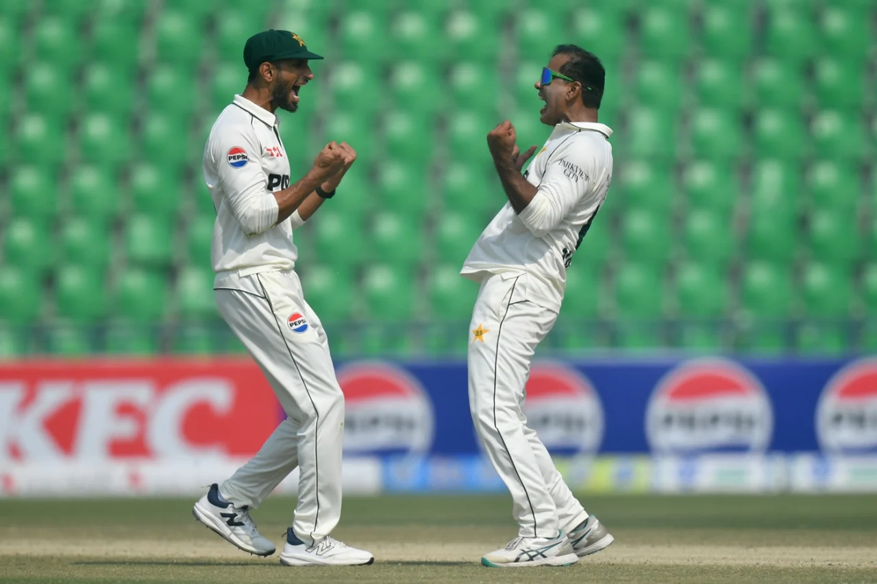 Pakistan skipper Shan Masood celebrates with star spinner Noman Ali 