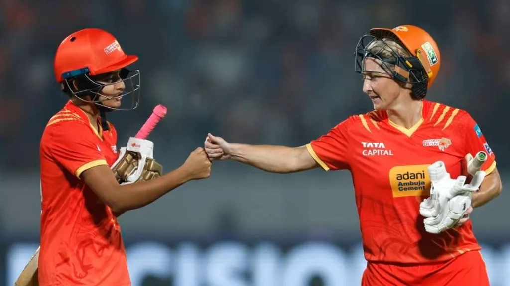 Sophie Devine and Kanika Ahuja during the WPL match against UP Warriorz in Vadodara.
